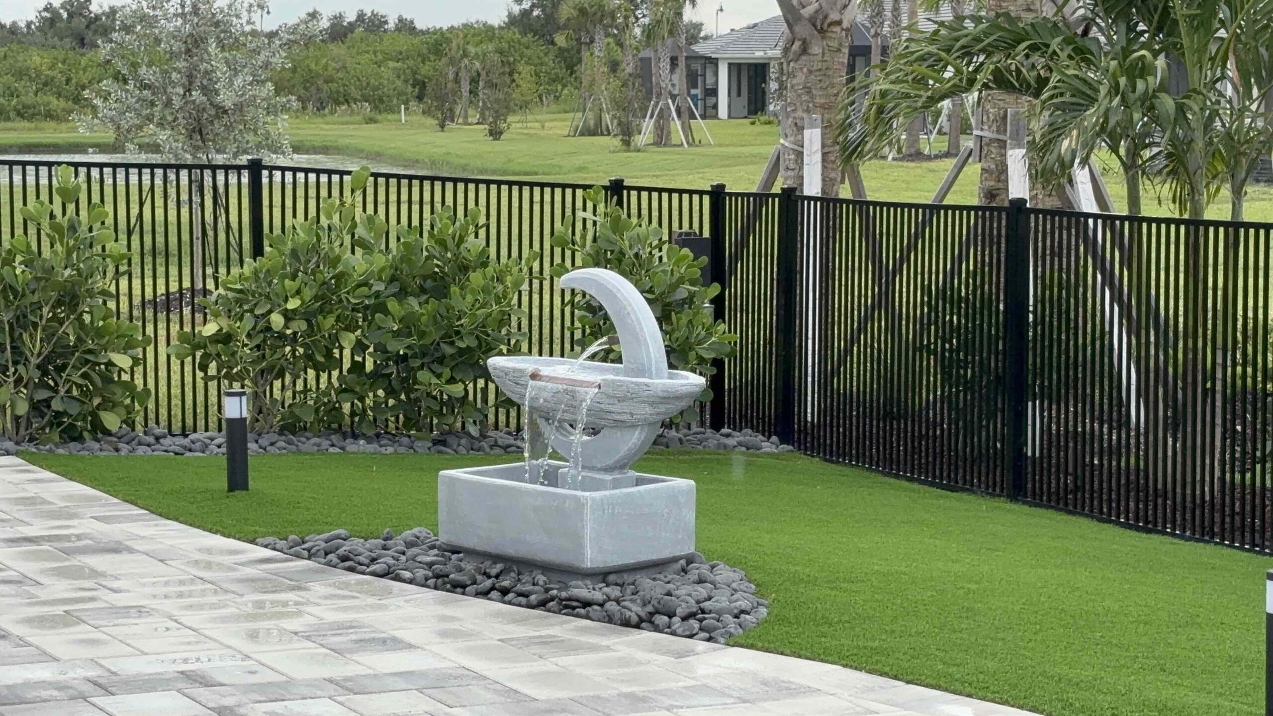 Pavers-and-Patios-with-Artificial-Turf-and-Water-Feature-scaled